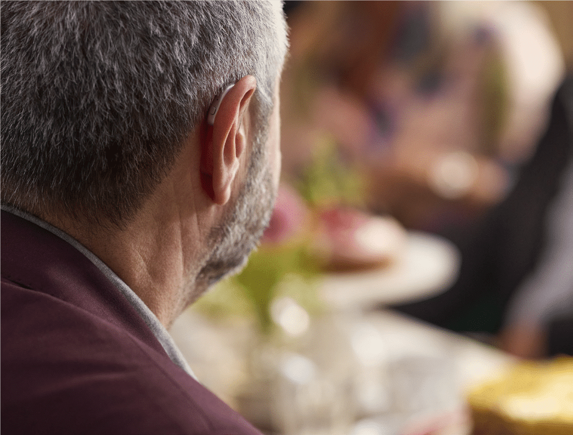 a man is viewed from the back wearing ReSound nexia Hearing Aids