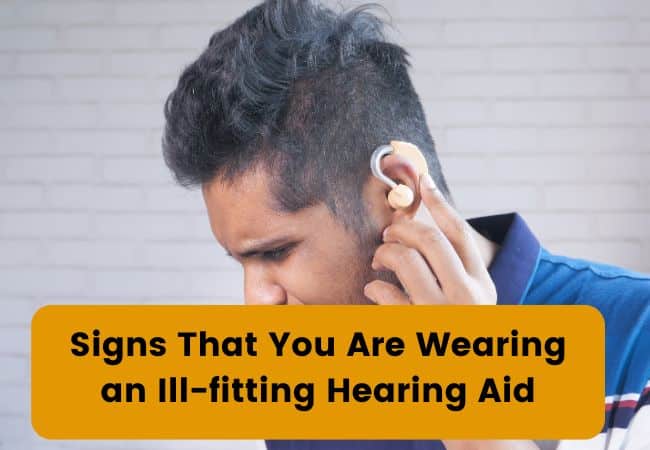 A Man wears a poorly fit hearing aid