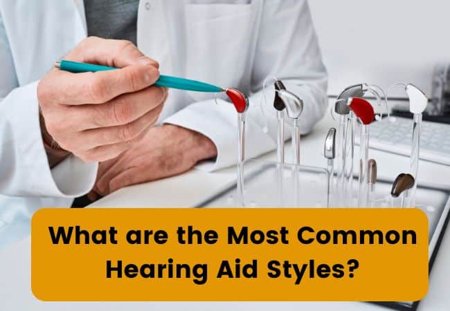 Various Hearing AIds Are Displayed on a Desk