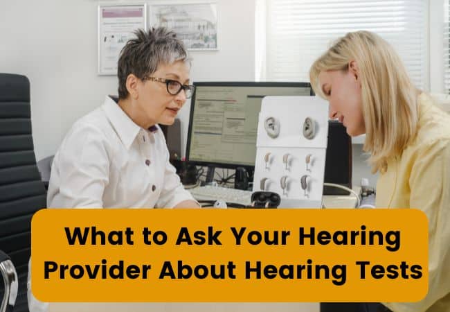 A woman consults with a hearing provider in a clinic