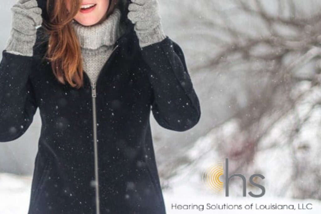 woman playing in the snow