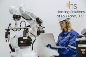 woman working with advanced machinery